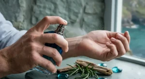 A man applying a fresh, aquatic cologne, perfect for daily wear or formal occasions.