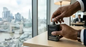 Alt text for image 2: A close-up showing the correct technique for applying a light, professional-grade cologne.