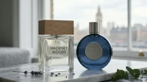 A blue, round, textured glass bottle labelled "RIVER THAMES" alongside a matching dark blue presentation box with a wave-like texture.